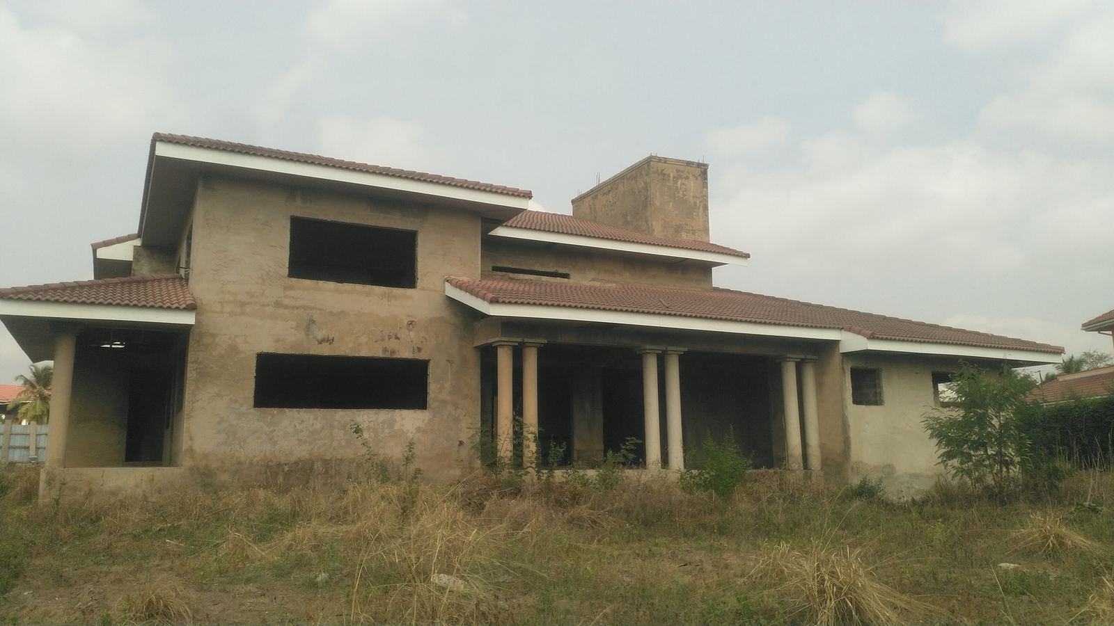 The unfinished house from the rear, before works