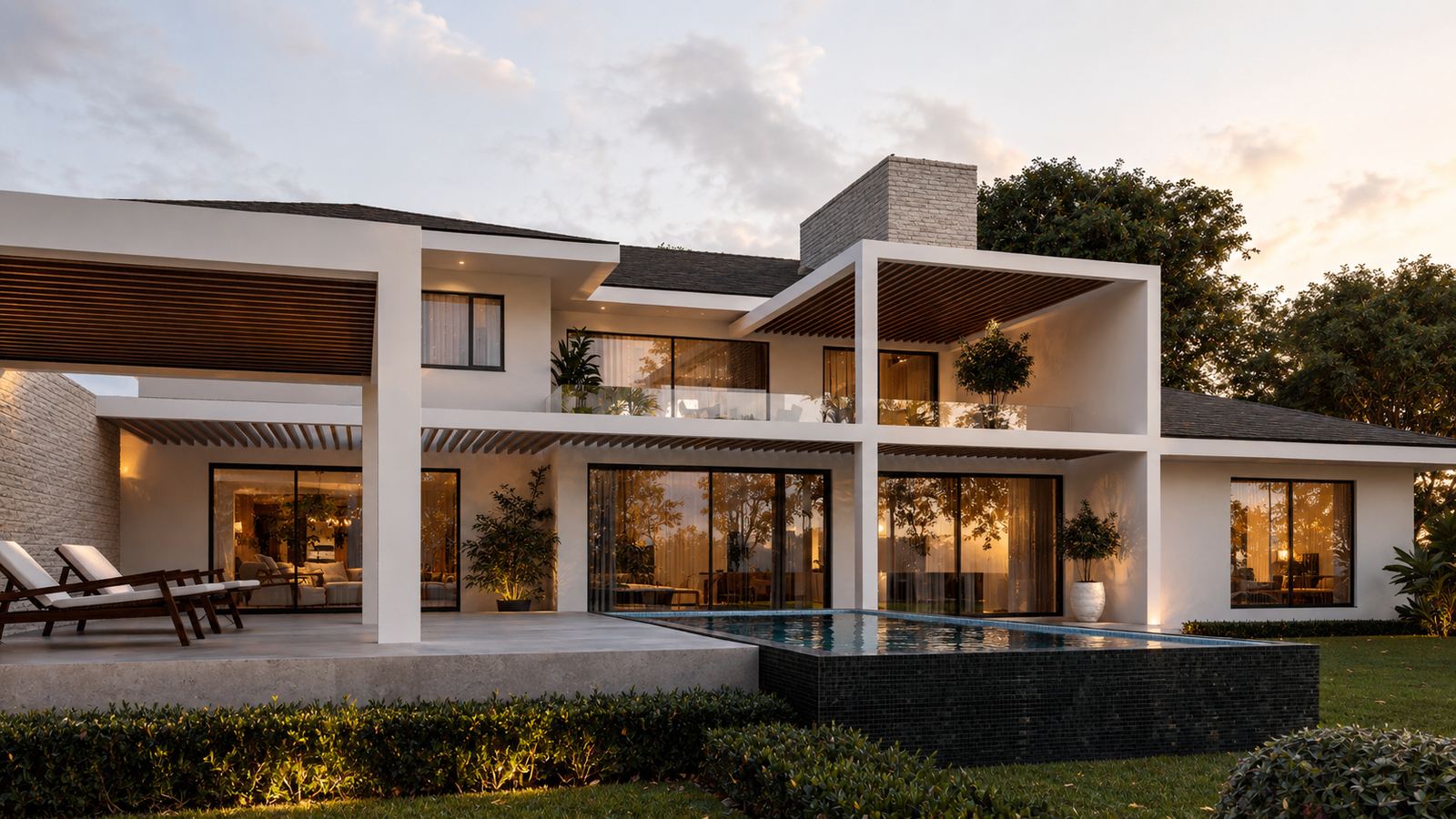 Transformed rear elevation at dusk, with pool and loggia